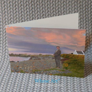 A Fine Art greeting card of a brooding painting of a man on a beach at dusk as a storm gathers. The card is blank inside