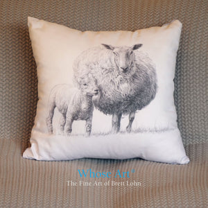 Sheep drawing on a cushion placed on a blanket