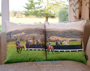 Pillow covers of horses racing over jumps at cheltenham racecourse