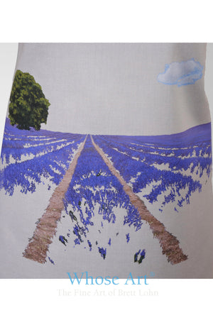 detail of a lavender fields painting printed on the front of an apron.