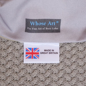 label from a fine art cushion stating that it is made in Great Britain