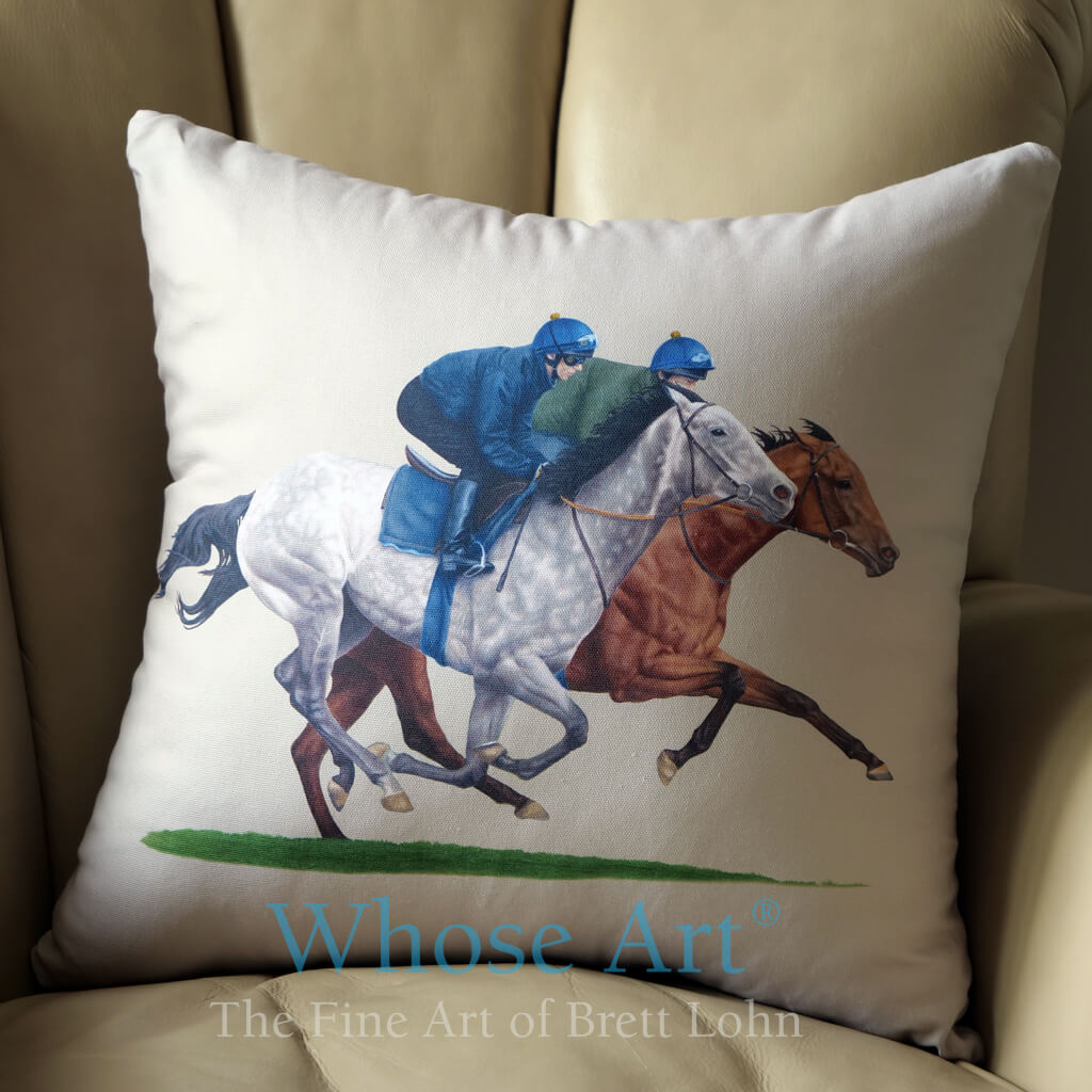 Galloping horses painting on a cushion, placed on an armchair