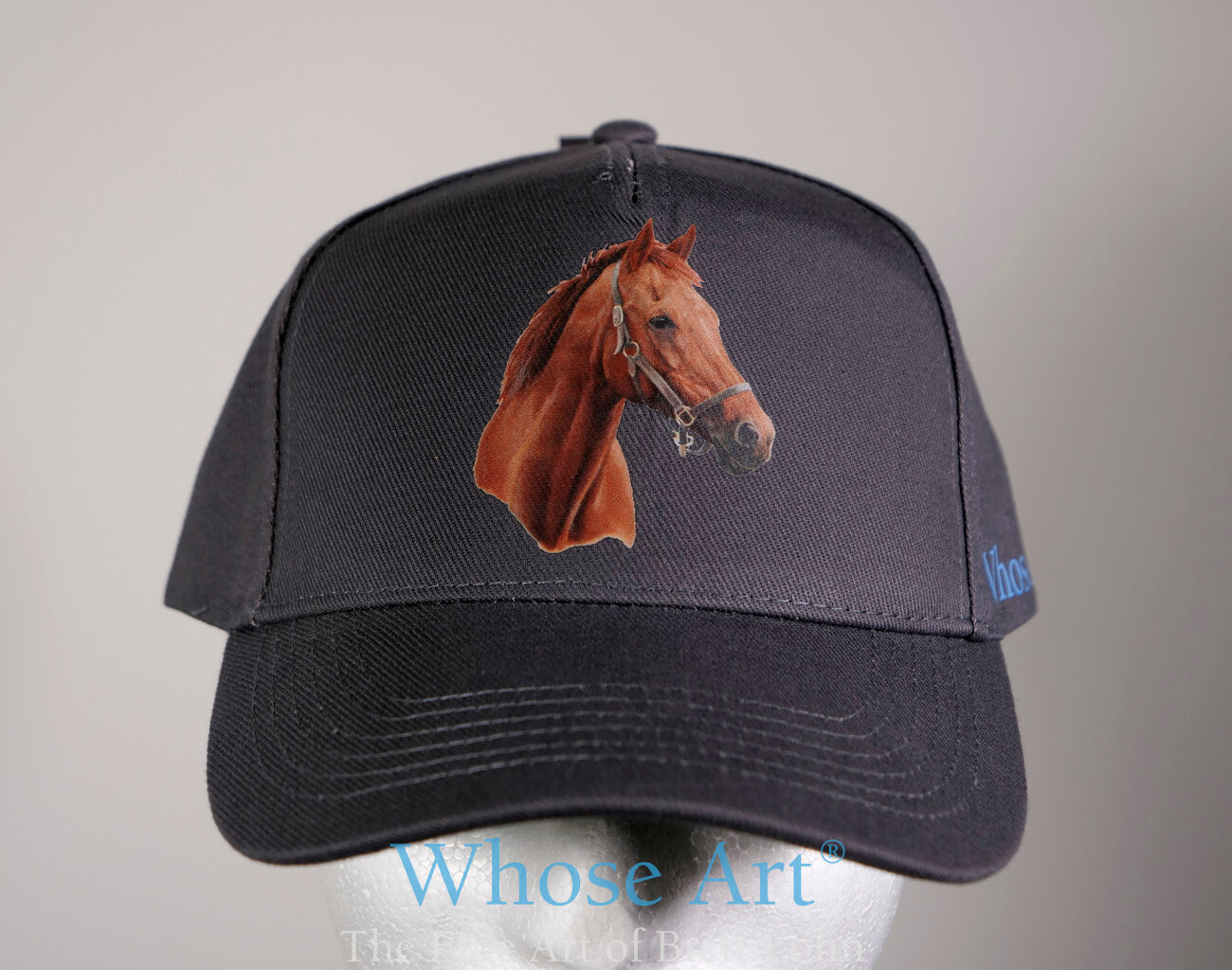 hat with a horse's head printed on the front