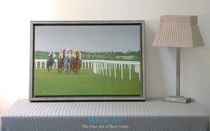 A Horse Racing Canvas wall art print placed in an interior design setting. The Horse Art print depicts evening racing at Epsom