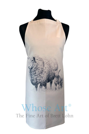 Fine art apron wth a drawing of sheep in the middle. Hanging on a tailor's dummy.