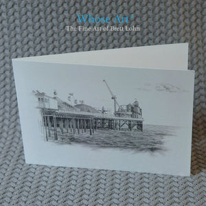 Brighton Festival Art Card with a drawing of the Palace Pier funfair on the front. The greeting card is blank inside.