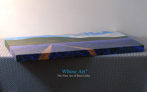Canvas art print in gallery wrap with 38mm stretchers showing a painting of sunny lavender fields. Canvas lies flat on a table
