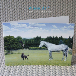 Equestrian Art Greeting Card of a painting of a horse and dog standing together in a field in the summer.