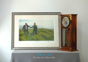 Framed mental health wall art picture of a hopeful lady in the sun, leading a man towards freedom on a grassy beach.