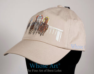 horse racing hat with a picture of racehorses printed on the front